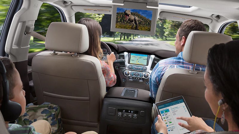 Rear seat passengers watching screen